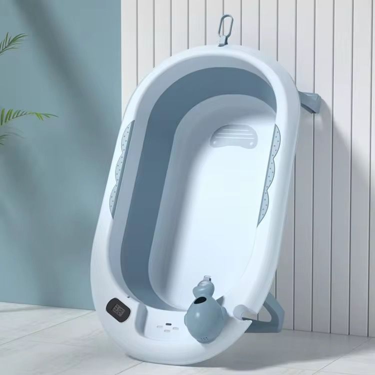 Bañera con termómetro y cojín estilo ballena